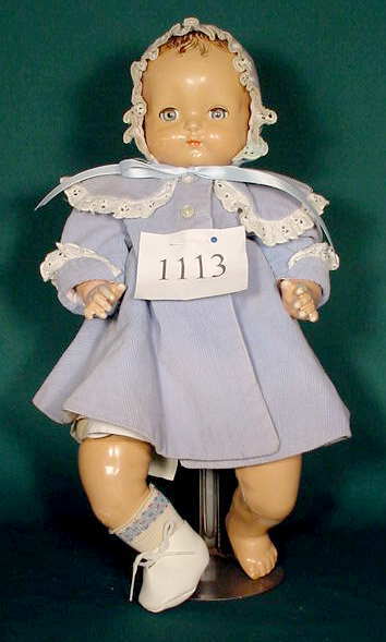 Compo & Cloth Effanbee Doll NR: Please see the hundreds of other quality dolls in this sale! Compo head with cloth body and compo limbs, marked ©Effanbee, sleep tin eyes, painted mouth, molded hair, bent limb (Crazing all over head