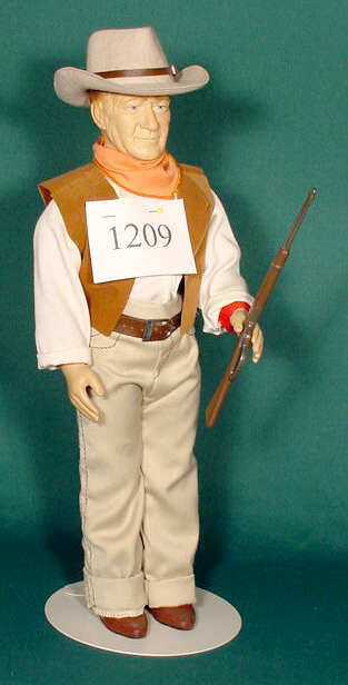 Effanbee John Wayne Symbol of the West Doll NR: Please see the hundreds of other quality dolls in this sale! Effanbee John Wayne as Symbol of the West, marked Wayne Ent. 1981 16 1/2" T. No Reserve! Note: Successful Buyers will have their credit car
