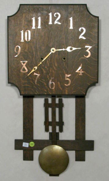 National Clock & Mfg. Co. Mission Oak Wall Clock: National Clock & Mfg. Co. Mission Oak Wall Clock: the attached metal numbers form a 10 3/4" dial. Time with half hour gong striking movement. Has pendulum. (The finish shows some wear. There is a begi