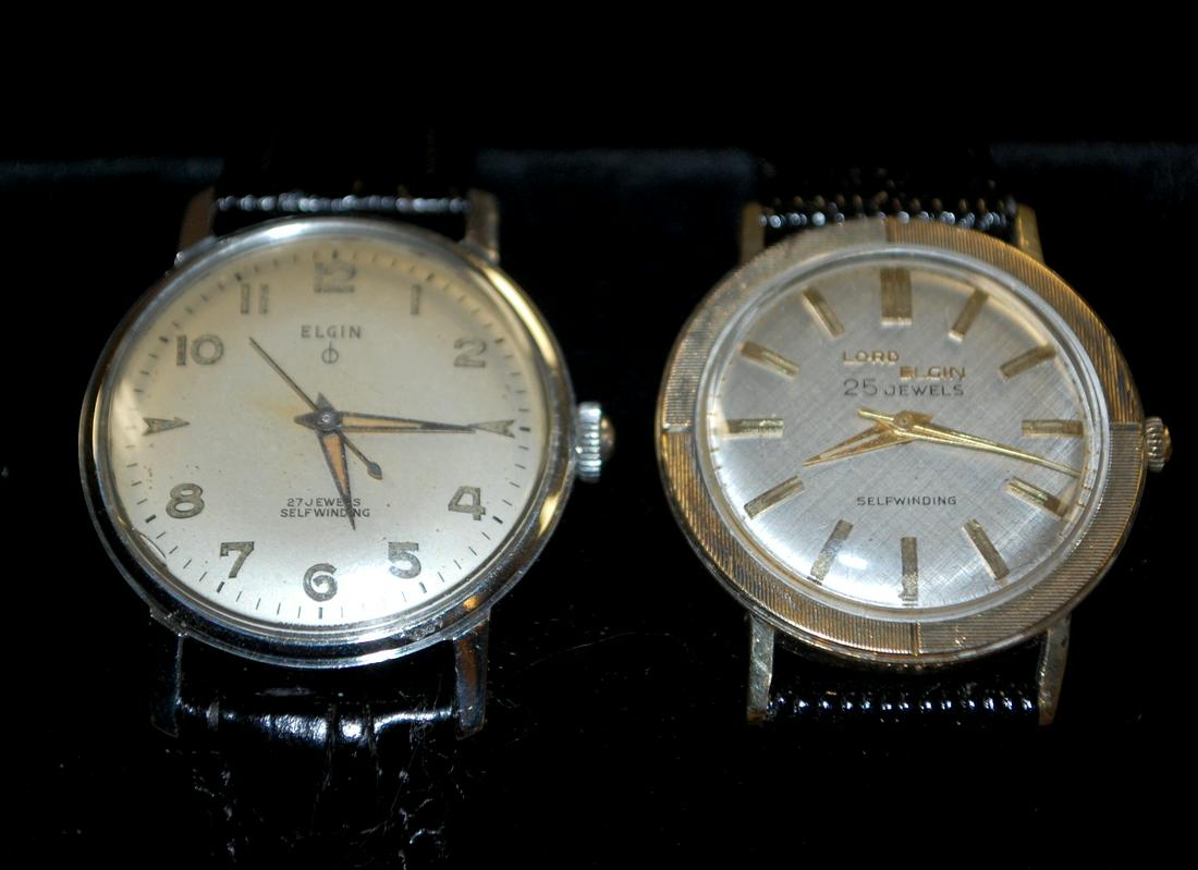 2 Elgin Self-Wind Wrist Watches 25J-27J: 2 Elgin Self-Wind Wrist Watches 25J-27J : 1) Elgin 27J, grade 761 self wind movement, running, SS case in good condition, dial in good condition, black leather replaced band. 2) Lord Elgin 25J, grade 