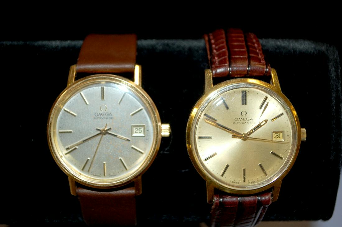 2 Omega Automatic Men's Wrist Watches: 2 Omega Automatic Men's Wrist Watches: GP, 1) Presentation Watch - Engraved on back "Amoco - Louis M. Thares 1948-1977", signed Omega 17J movement, grade 1010, #38-892525, dial in great condition, cra