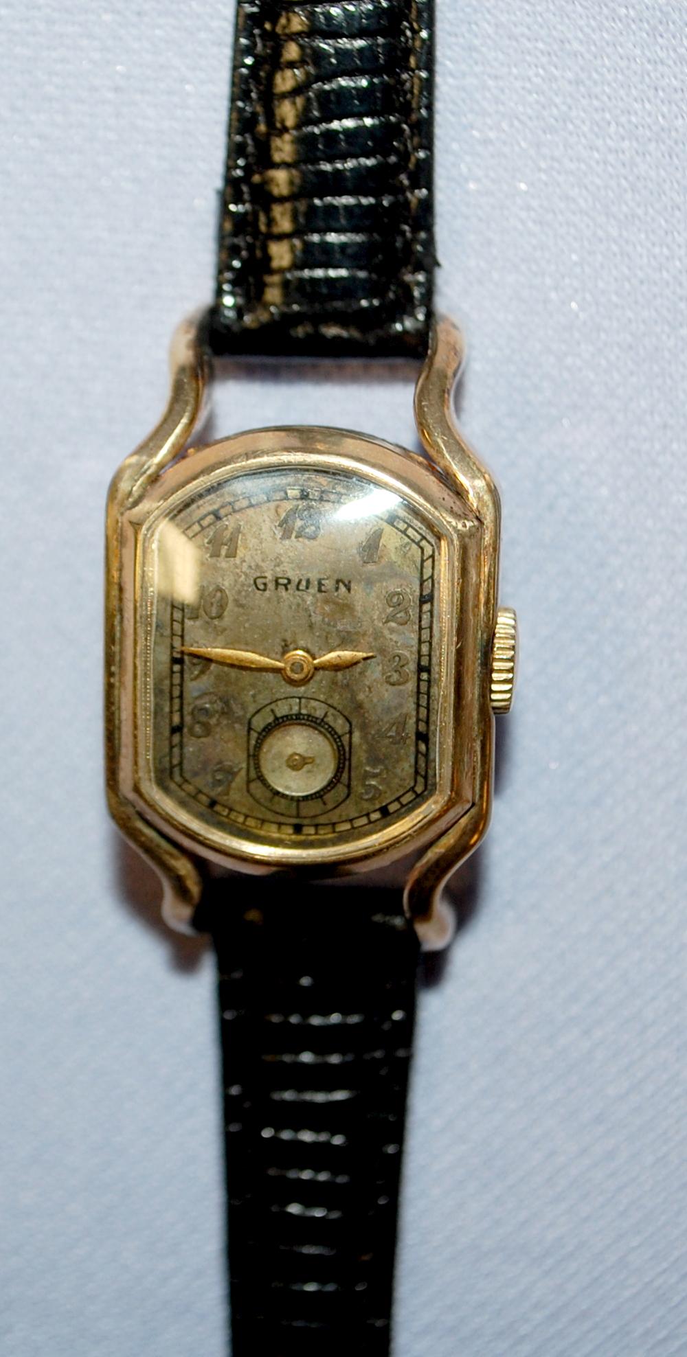 Gruen 15J Driver's Watch: Gruen 15J Driver's Watch: 15J movement numbered 4-42611, 10K GF bezel with guildite back, light scratches and wear to case, dial dirty and needs restored, black leather Hadley Roma band, seconds hand 
