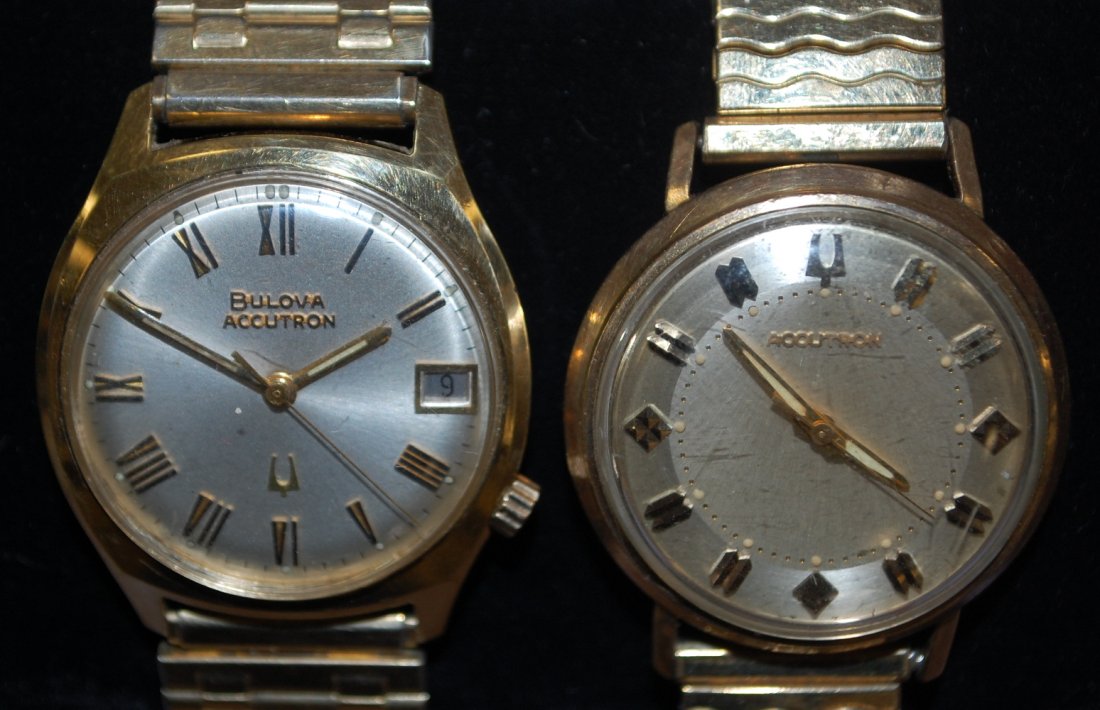 Lot of 2 Bulova Accutron Wrist Watches: Lot of 2 Bulova Accutron Wrist Watches. 1.) Bulova 214 mvmt in 10k GF case w/ wear; champagne dial w/ some dirt/ spotting; flex band; not tested. 2.) Bulova 2181 mvmt in 14k GF case w/ wear; Two tone 
