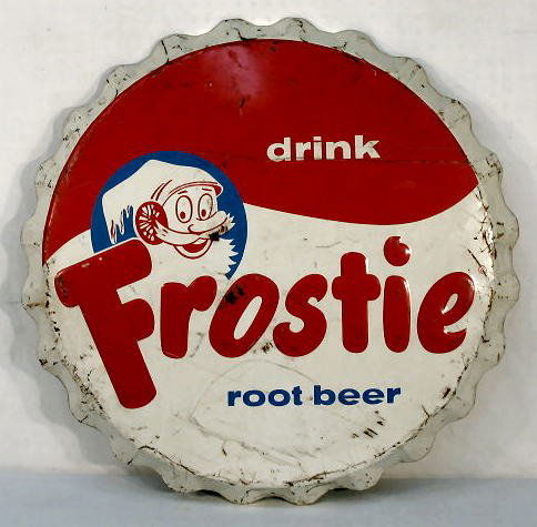 Frostie Root Beer Metal Bottle Cap Sign: Frostie Root Beer Metal Bottle Cap Sign: red, white and blue colors. (There are scrapes, scuffs and scratches all over.) 33" wide All items sell As Is, Where Is, no guarantees of any kind. We accept M