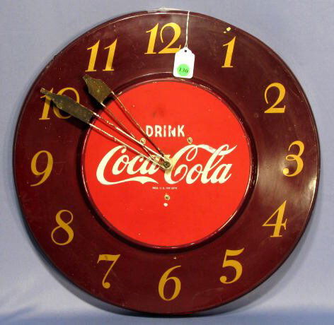 Coca Cola 1951 Metal Wall Clock by Telechron: Coca Cola 1951 Metal Wall Clock: made by Telechron Co., made of aluminum. (There is a paint splash and scattered chips. When plugged in the motor hums. The paint on the hands is heavily worn.) 17 1/2"