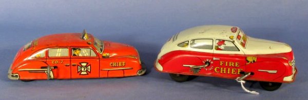 2 Wind Up Toy Cars: Courtland & Lupor: 2 Wind Up Cars: Courtland & Lupor: 1.) The Courtland fire chief car has a hand crank siren also. 7 1/4" l 2.) The Lupor fire chief car is orange. 7 1/4" l (Both have some surface scratches and wear. T