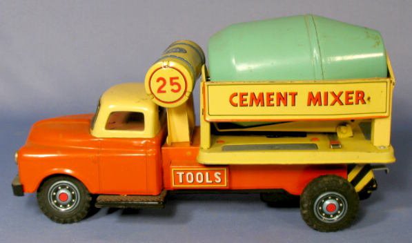 T.M. Japan Cement Mixer Battery Operated Toy: T.M. Japan Battery Operated Toy Cement Mixer: orange, tan and green, it is designed to roll the tank as the truck runs about. (Not working. The battery compartment is clean, with no corrosion. The tru