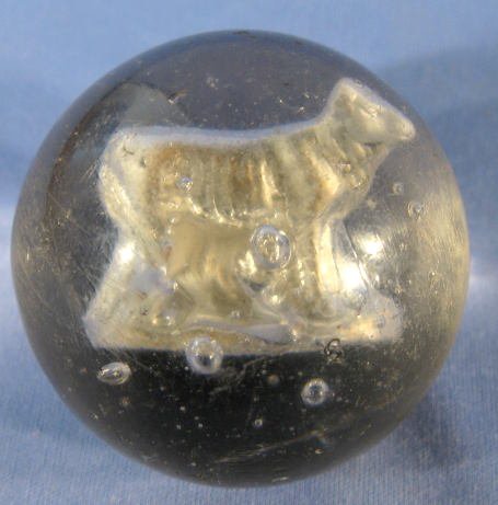 Sulphide Marble w/a Standing Cow: Sulphide Marble w/a Standing Cow: has 2 pontils. There are some attached air pockets and other large air bubbles on one side. (Never ground, there are some small nicks and abrasions.) 2 1/8" wide All 