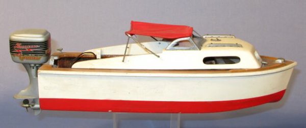 Wooden Toy Motor Boat w/Electric Motor: Wooden Toy Motor Boat w/Electric Motor: the boat is unmarked. The motor is marked N.M.C. Hurricane 22. The motor looks complete, but not tested. 12" long All items sell As Is, Where Is, no guarantees 