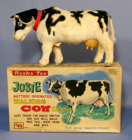 toy cow that moos and walks