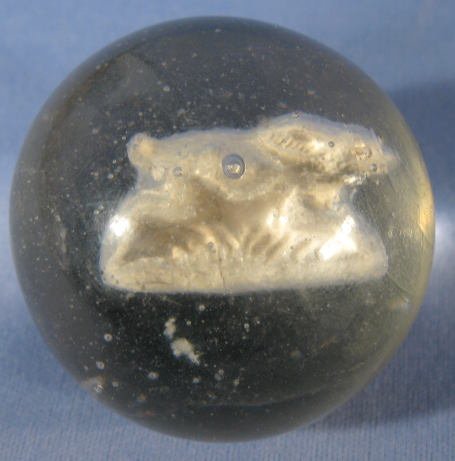 Sulphide Marble w/ a Running Rabbit: Sulphide Marble w/ a Running Rabbit: has one pontil. (Never ground, it has an abrasion or contact hit with no chip. Also a bit of rub marks. There is some air by the legs and a lot of tiny bubbles in 