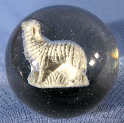 Sulphide Marble w/ a Lamb: Sulphide Marble w/ a Lamb: it is standing with erect head. It has a single pontil. (Only one contact mark of note. There are a couple almost unnoticeable marks on this fairly clean example.) 2" wide A