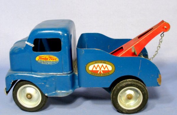 Tonka Official Service Steel Toy Truck: Tonka Steel Official Service Truck Toy: dark blue with a red hand crank hoist in the back. Described as a cab over wrecker truck No.250. Circa 1953. With labels in good condition. (There are signs of