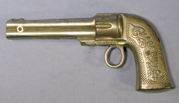 "Magazine" Cast Iron Toy Gun: Cast Iron "Magazine" Toy Gun: marked on one side- Patented April 26, 1892- Made in U.S.A. It is nickel plated and cocked by moving the round trigger forward. There is no indication that it fires caps.