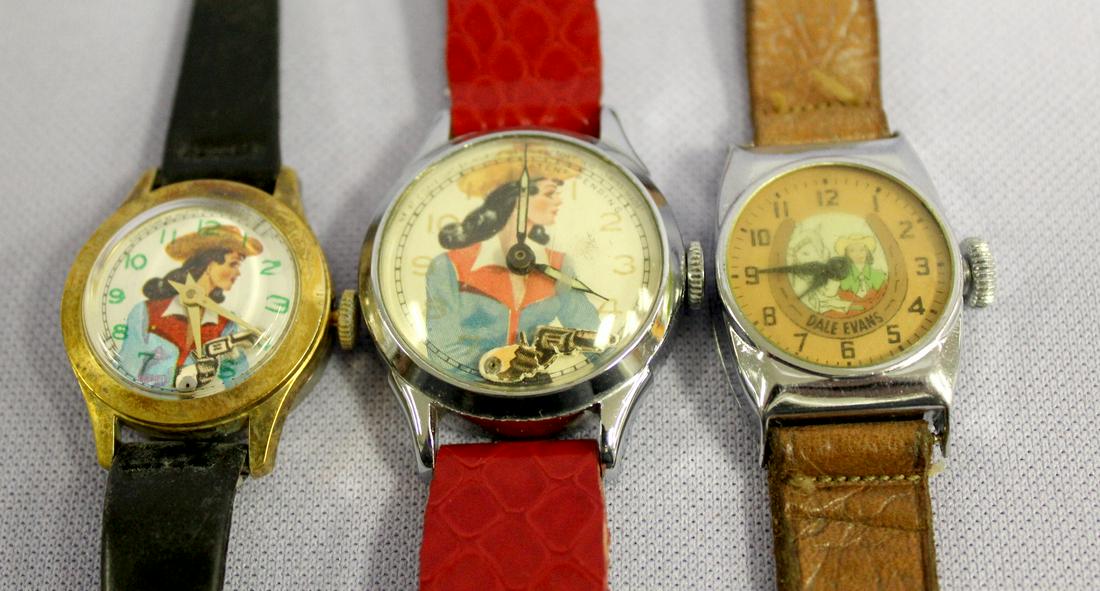 3 Dale Evans Wrist Watches: 3 Dale Evans Wrist Watches. 1- 2 have moving guns for the seconds. One is swiss movement, running. The other is large, also swiss movement and not running. 3 has a round buckskin ring on the dial. She