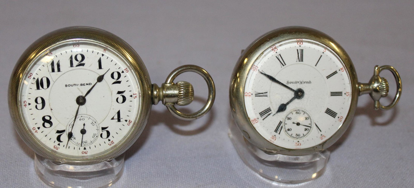 2 South bend 17J 18s OF NI DMK Pocket Watches: 2 South bend 17J 18s OF NI DMK Pocket Watches. 1- No. 407201 in a No.333260 SF&B Fahys ore silver case with scuffing & pinpricks. Dial is bad. 2- No. 397674 in an SF&B No. 420782 Philadelphia Silverod