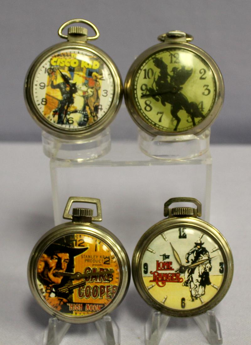 4 Comic Character Pocket Watches: 4 Comic Character Pocket Watches. 1- Lone Ranger- made in the US, the dial has him on the trigger and name. Not running 2- Crisco kid showing him a partner in a gun battle. Made in USA- not running. 3