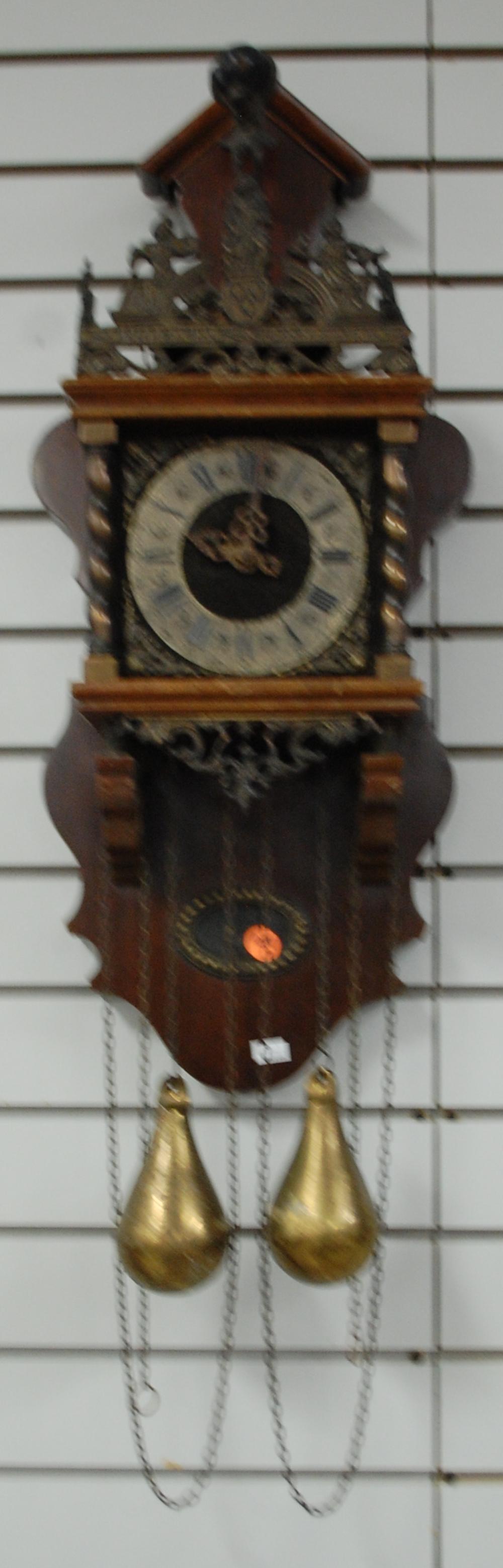 Vintage Zaanse Zaandam Dutch Wall Clock: Vintage Zaanse Zaandam Dutch Wall Clock: decorated dial, weight driven movement, bronze metal figures and ornaments, mahogany case, brass weights. 26" x 10" **This clock is FOB which means shipping is