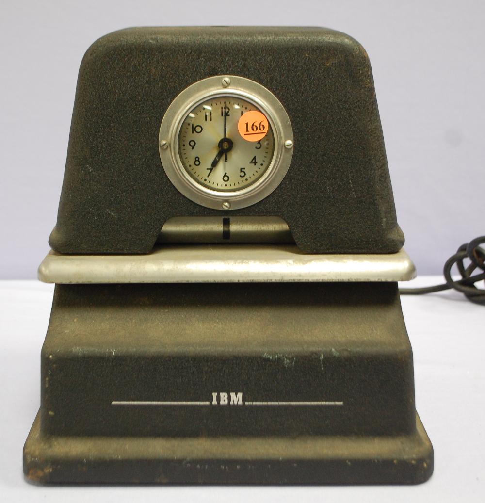 Vintage International Electric Time Clock: Vintage International Electric Time Clock: Model 2500-5, has IBM on front, black metal case, good label on back. 11 3/4" x 10 3/4" x 9 1/4" **This clock is FOB which means shipping is ENTIRELY the buy