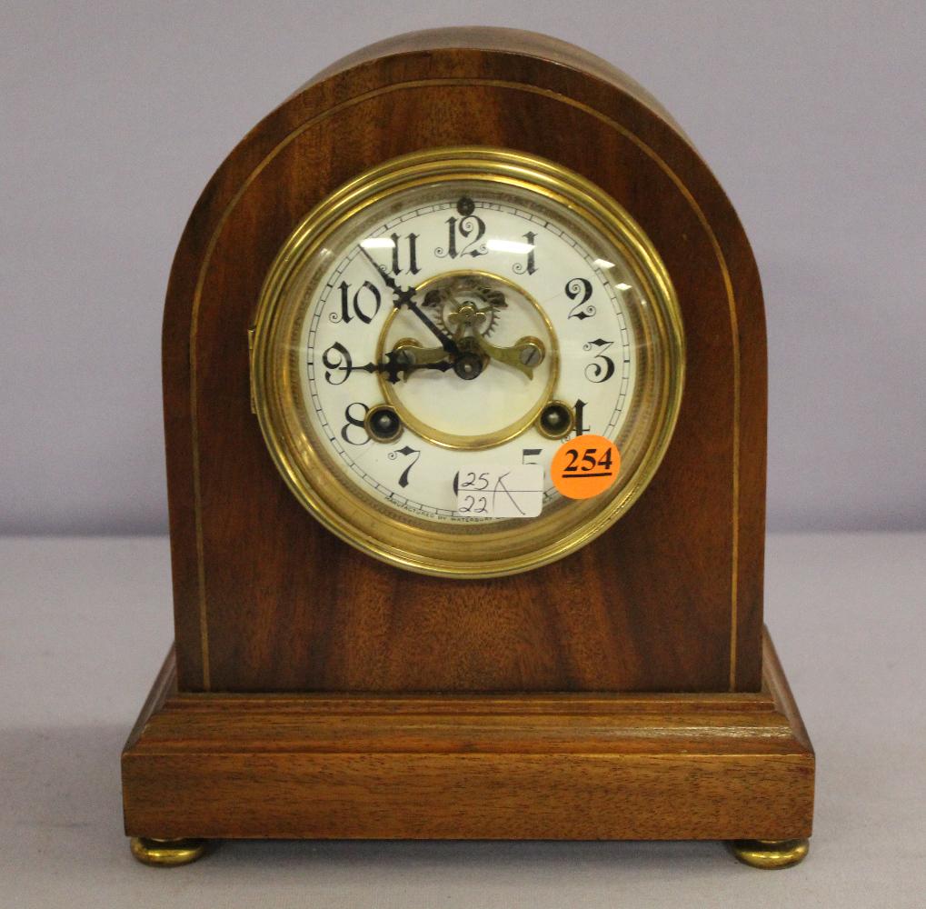 Antique Waterbury "Southampton" Shelf Clock: Antique Waterbury "Southampton" Shelf Clock: signed porcelain open escapement dial, signed T&S movement, mahogany inlay case, beveled convex glass. 9" x 7 3/8"