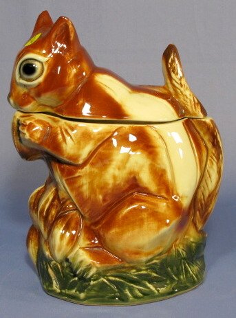 McCoy Chipmunk Cookie Jar: McCoy Chipmunk Cookie Jar: marked McCoy USA. (Lid and ear are chipped, the base is crazed and stained.) 10 1/4" All items sell As Is, Where Is, no guarantees of any kind. We accept Mastercard & Visa, 