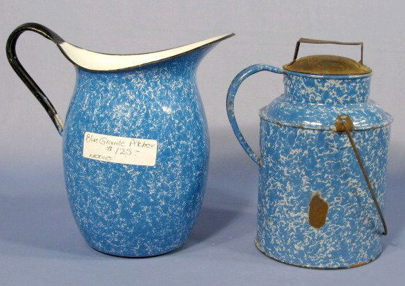 2 Blue Granite Items: 2 Blue Granite Items: 1.) Water pitcher with black handle and rim. Fine pattern. 9" 2.) Boston Cream can, blue and white, medium mottled with tin lid and bail. 9" (Rust spot on side of can. Lid rusted