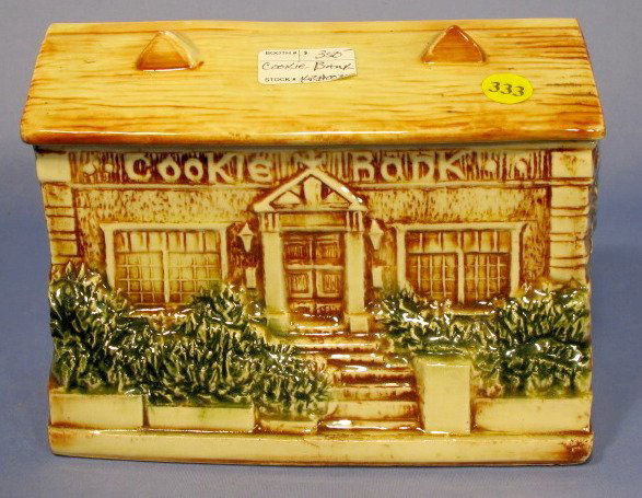 McCoy "Cookie Bank" House Cookie Jar: McCoy "Cookie Bank" House Cookie Jar: plastic plug in lid. No condition problems. 7" x 8 1/2" All items sell As Is, Where Is, no guarantees of any kind. We accept Mastercard & Visa, no paypal, no pers