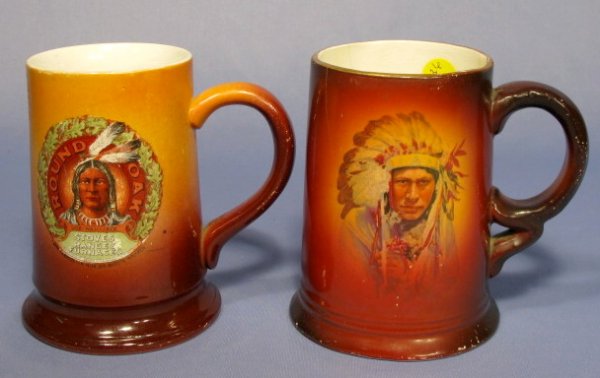 2 Goodwin China Mugs: Round Oak Stoves & Indian: 2 Goodwin China Mugs: 1.) Round Oak Stoves, Ranges, Furnaces, Indian transfer mug. "Compliments of Estate of P.D. Beckwith, Dowagiag, MI. Makers of Good Goods Only", 1907. 5" tall (Minor paint chips, 