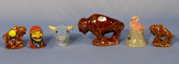 Group of 6 Rosemeade Pottery Items: Group of 6 Rosemeade Pottery Items: all have paper labels. 1.) Pair buffalo salt and pepper shakers. Souvenir Badlands. 2.) Pair Paul Bunyan & Blue Ox Babe shakers. 3.) Buffalo bank. "World's Largest 