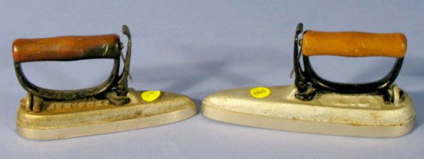 2 "Sensible" Cast Iron Sleeve Irons: No.1 & No.5: 2 "Sensible" Cast Iron Sleeve Irons: with detachable wood handles. No.1 and No.5. No condition problems. 8" & 6 1/2" All items sell As Is, Where Is, no guarantees of any kind. We accept Mastercard & V