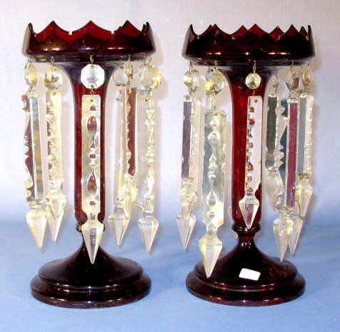 Pr. Ruby Cut To Clear Mantle Lusters w/Prisms: Pr. Mantle Lusters w/Prisms: dark ruby colored glass with large clear glass prisms. (Some worn gold. 1 has a small interior chip on the crown shaped top.) 12 1/2" tall All items sell As Is, Where Is,