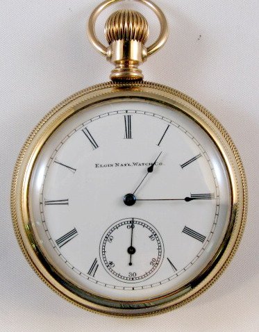 Elgin National 7J 16S Pocket Watch: Elgin National 7J 16S Pocket Watch: open face, gold filled. Serial no.2758686. In a yellow B.W. Co. Windsor, 1884 case numbered 496217. (The dial has a faint fracture between the 10 and 11. The case i