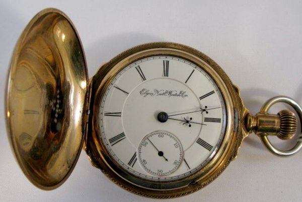 Elgin BW Raymond 17J 18S Pocket Watch: Elgin BW Raymond 17J 18S Pocket Watch: open face, lever set. Serial no.5414818, adjusted. In a yellow Keystone hunting case numbered 2393998. The dust cover is engraved with "J.J. Pothen 3-19-1895". (