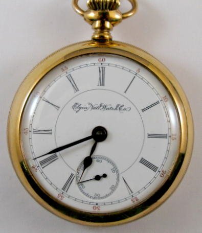 Elgin G M Wheeler 17J 18S Pocket Watch: Elgin G M Wheeler 17J 18S Pocket Watch: open face, serial no.5799220, adjusted. In a yellow 20yr Keystone case no.5512045. (Not running, winds ok. The balance wheel does not kick in. The dial looks go