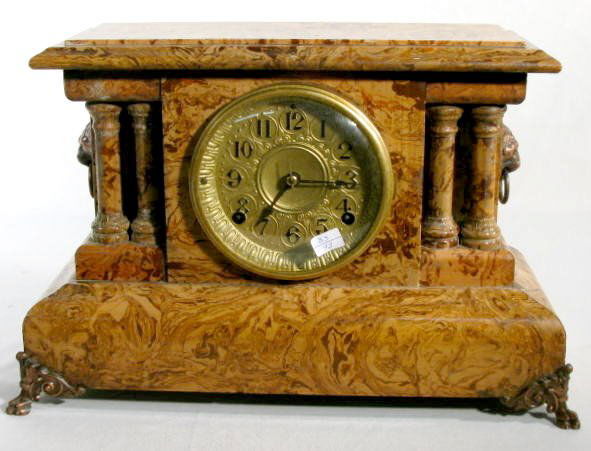 Seth Thomas Adamantine Mantel Clock: Seth Thomas Adamantine Mantel Clock: 8 day time with half hour gong striking movement. The 5 1/2" dial is metal painted gold. Not Tested. (No pendulum, it does wind.) 11" t x 17" w All items sell As I