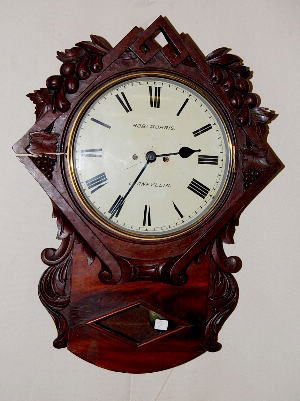 R. Morris Llanfyllin English Double Fusee Clock: Robert Morris LLanfyllinEnglish Double Fusee Walnut Carved Regulator Clock: 11 1/2" dial; not tested. (Small veneer damages; scratches to dial; split in wood at 9:00 area.) 27" All items sell As Is, W