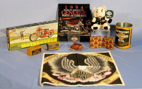 Group of 8 Harley Davidson & 2 Indian Items: Group of 8 Harley Davidson & 2 Indian Items: Harley Davidson includes: 1994 catalog, empty oil can (no lid), scarf "Too Tough To Die", model box, and other small items. Indian items are 2 Indian Genui
