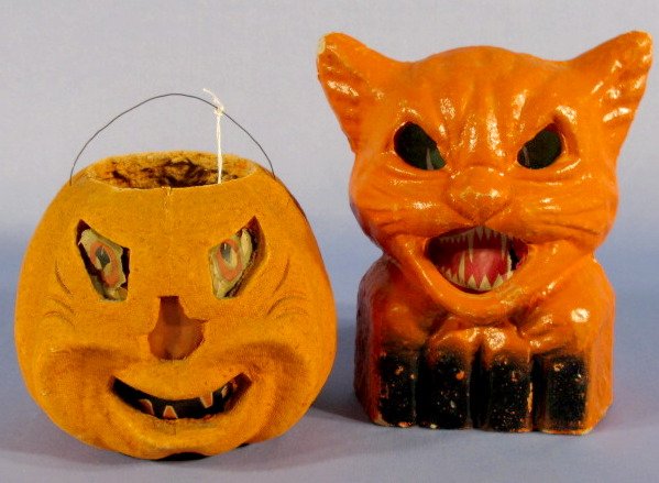 2 Halloween Paper Mache Jack O' Lanterns: 2 Halloween Paper Mache Jack O' Lanterns: 1.) Figural cat, orange with black fence base, paper green eyes and red mouth with teeth. 8" (Paint loss to ear tips.) 2.) Jack o' Lantern, orange with paper