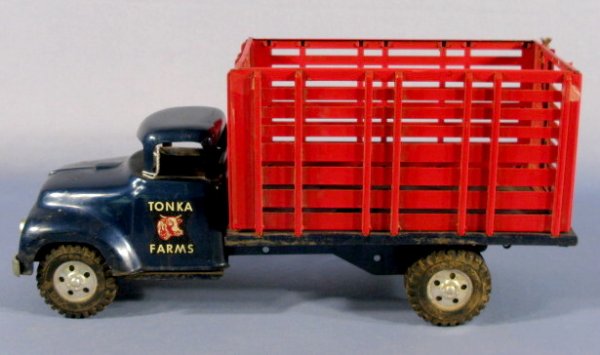 Tonka Farms Stake Truck w/Tonka Toys: Tonka Farms Stake Truck w/Tonka Toys: rubber tires, cobalt and red steel. Good condition. 15 1/2" long All items sell As Is, Where Is, no guarantees of any kind. We accept Mastercard & Visa, no paypal