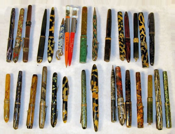 Group of 31 Fountain & Ink Pens: Group of 31 Fountain & Ink Pens: 8 with 14K gold nibs, multicolored plastics. 1 Eagle; 1 Indian; 1 Majestic; 1 Ritvie (sp.?); 1 Weaeuer; 1 Pioneer; 1 Supreme; 1 Remington; 4 Sheaffer's; 5 Parker; 8 wi