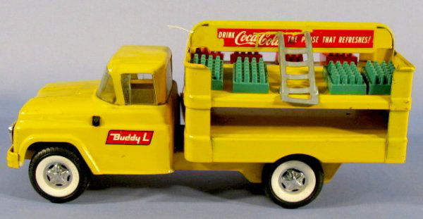 Buddy L Toy Coca Cola Advertising Truck: Buddy L Coca Cola Truck: "Drink Coca Cola the Pause That Refreshes", with 6 plastic bottle cases and ladder. (Sign decal scratched on both sides, scratches on hood.) 14" long All items sell As Is, Whe
