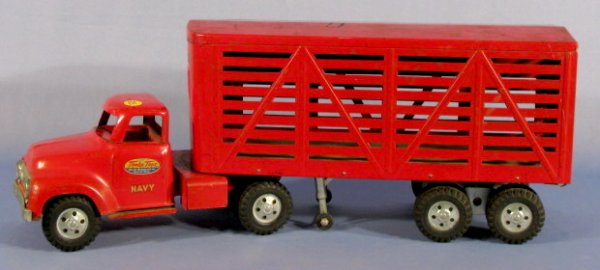 Tonka Toys "Navy Livestock" Semi Truck: Tonka Toys "Navy Livestock" Semi Truck: red steel with rubber Tonka tires. (Scratched) 25" long All items sell As Is, Where Is, no guarantees of any kind. We accept Mastercard & Visa, no paypal, no pe