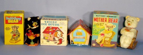 Group of 3 Battery Operated Toys: Group of 3 Battery Operated Toys: made in Japan 1.) Knitting Bear in box 2.) Mother Bear in rocking chair in box 3.) Tricky Dog House in box (Lid damaged.) Largest is 10" All items sell As Is, Where I