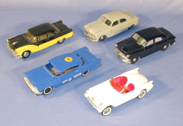 5 Plastic/Metal Car Dealers Model Cars: 5 Plastic/Metal Car Dealers Model Cars: 1.) 1958 City Police, blue 2.) Fairlaine A.M.T. Inc., yellow and black 3.) Ford, key wind, silver 4.) Ford, key wind, cobalt 5.) Corvette, white. 8" All items s
