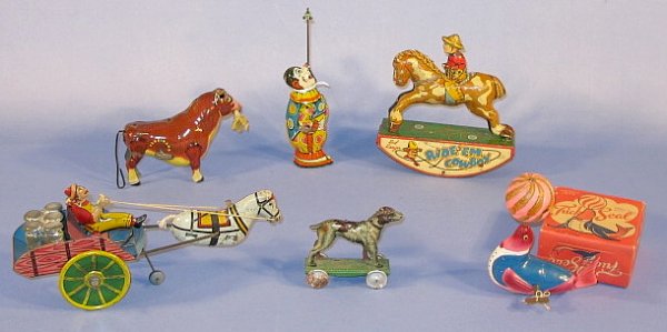 Group of 6 Tin Litho Toys, Marx & Wyandotte: Group of 6 Tin Litho Toys: 1.) Marx 1938 Ferdinand, key wind. (No horns.) 2.) Chein Clown, key wind. (Minus spinning item.) 3.) Wyandotte "Red Ranger Ride 'Em Cowboy", key wind (2 clips off horse hoov