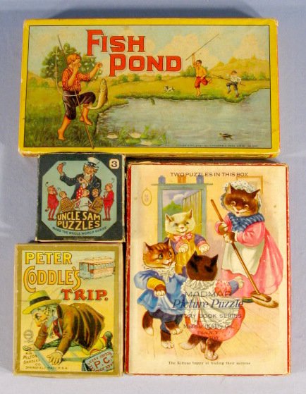 4 Antique Games & Puzzles in Original Boxes: Group of 4 Games & Puzzles in Original Boxes: 1.) Uncle Sam Puzzles 1920 by Sommer Mfg. Co. includes horse shoe and 3 rings metal puzzles 2.) Peter Coddle's Trip by Milton Bradley Co. 4119 3.) Madmar 