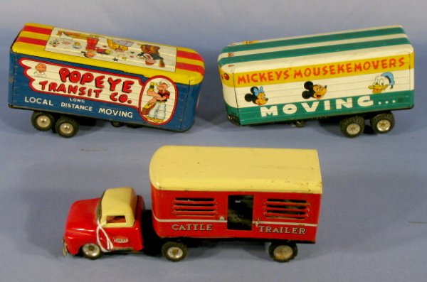 3 Tin Litho Toy Trailers, Popeye & Mickey: Group of 3 Tin Litho Trailers: 1.) #1845 Cattle Trailer with semi (Minus back door.) 2.) Popeye Transit Co. Trailer, King Features Synd. (Minus semi and 1 back door.) 3.) Mickey's Mousekemovers Moving