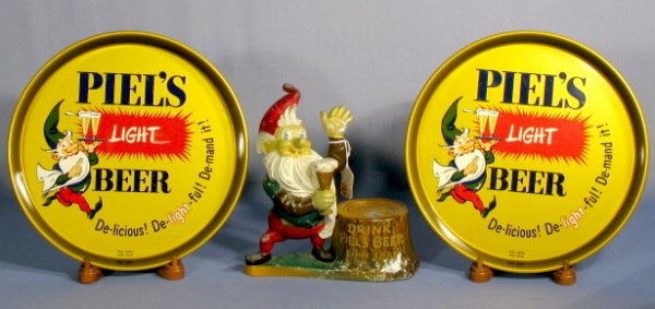 Group of 3 Piel's Beer Advertising Items: Group of 3 Piel's Beer Items: 1.) Metal figural display "Drink Piel's Beer Since 1883", stump holds beer (Beer bottle is not here. Paint loss.) 2.) 2 Piel's Light Beer serving tray, marked CANCO. 12"