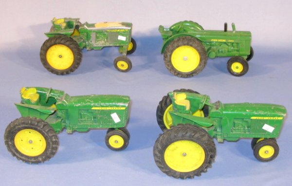 4 John Deere Toy Scale Model Die Cast Tractors: 4 John Deere 1/16 Scale Model Die Cast Tractors: 1.) 544 John Deere Diesel (Paint loss) 2.) Tractor (Minus stack, paint loss.) 3.) Tractor (Minus stack, paint loss.) 4.) Tractor (Minus stack, paint lo