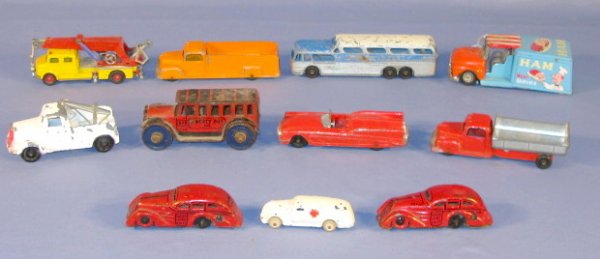 Group of 11 Steel & Tin Toy Automobiles: Group of 11 Steel & Tin Toy Automobiles: 1.) Greyhound bus (Paint chipped, rough.) 2.) Tootsie Toy orange truck (Paint chipped.) 3.) Siku German Mercedes Benz Kranqagen, no condition problems. 4.) Too